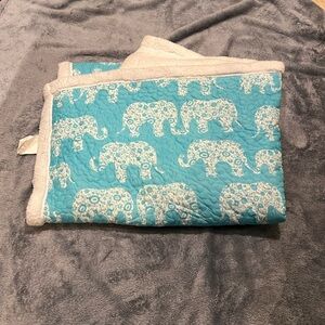 Elephant print reversible Sherpa throw blanket.